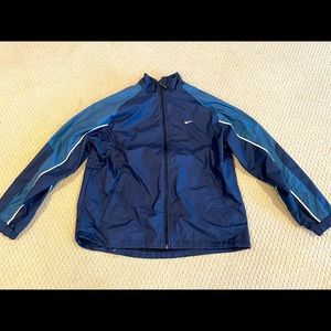 Vintage Nike Windbreaker Jacket
Blue
Size Large